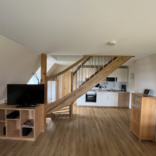 Küche und Wohnzimmer  in der Ferienwohnung Storchennest